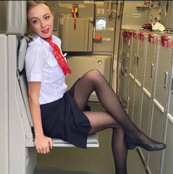 Sexy Flight Attendants With And Without Their Uniforms