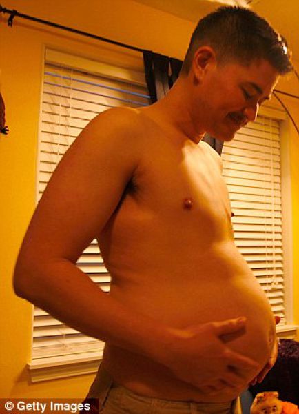 The First Ever Pregnant Guy Gives Birth to a Child