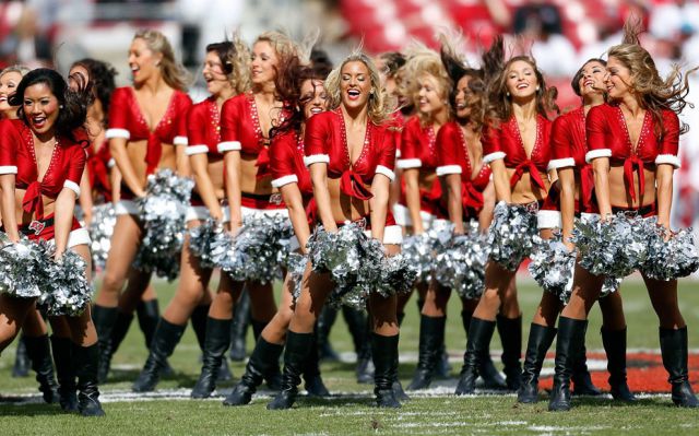 Cheerleading Snow Maidens Spread the Christmas Spirit