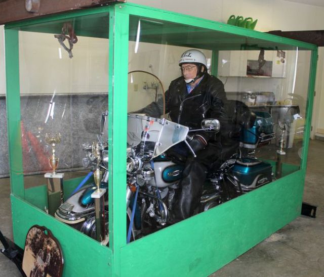 Biker Buried Riding His Harley Davidson