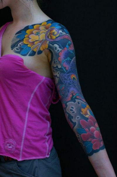 Tattoo Lovers Gather around for Epic Body Art